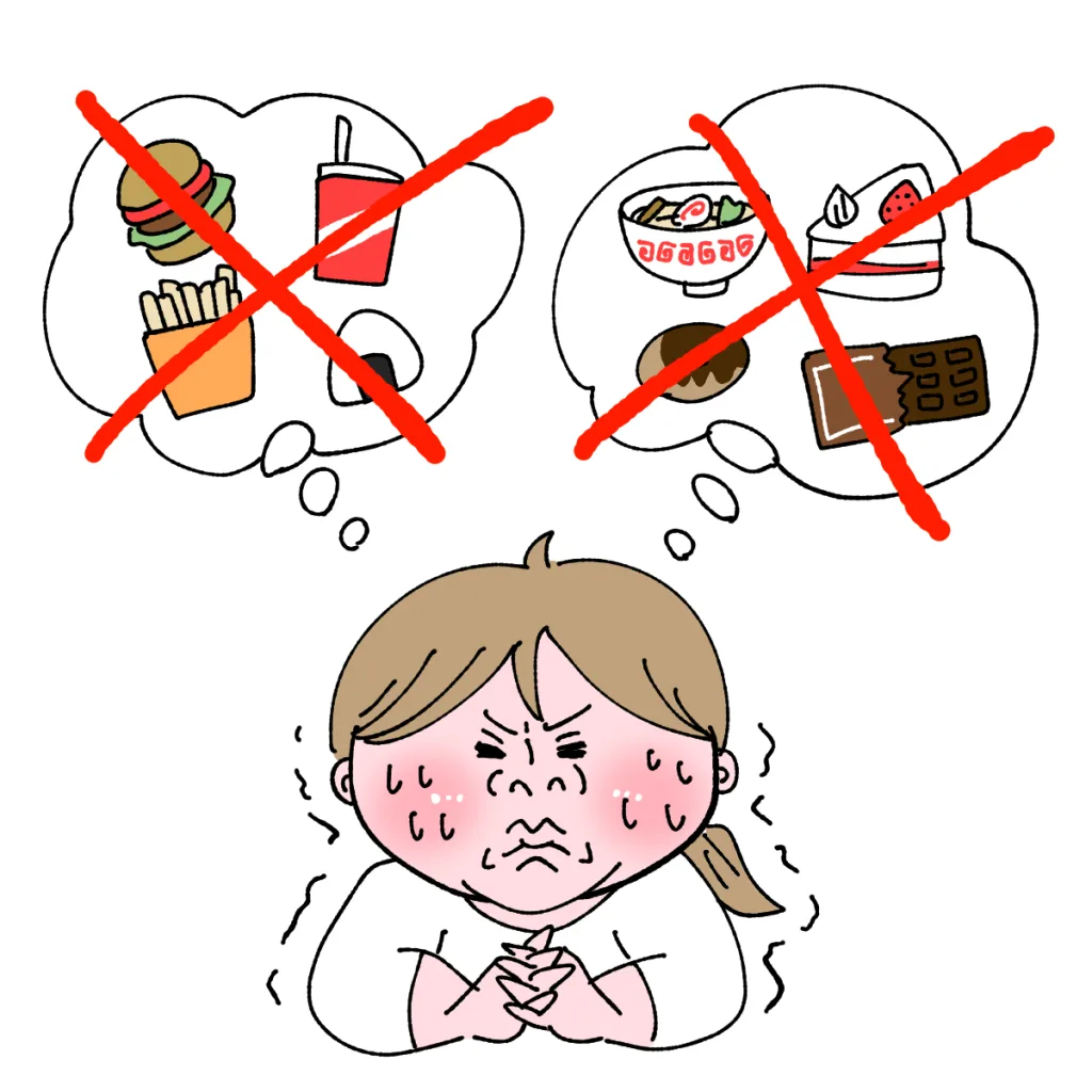 ダイエットのために食べるのを我慢している女性