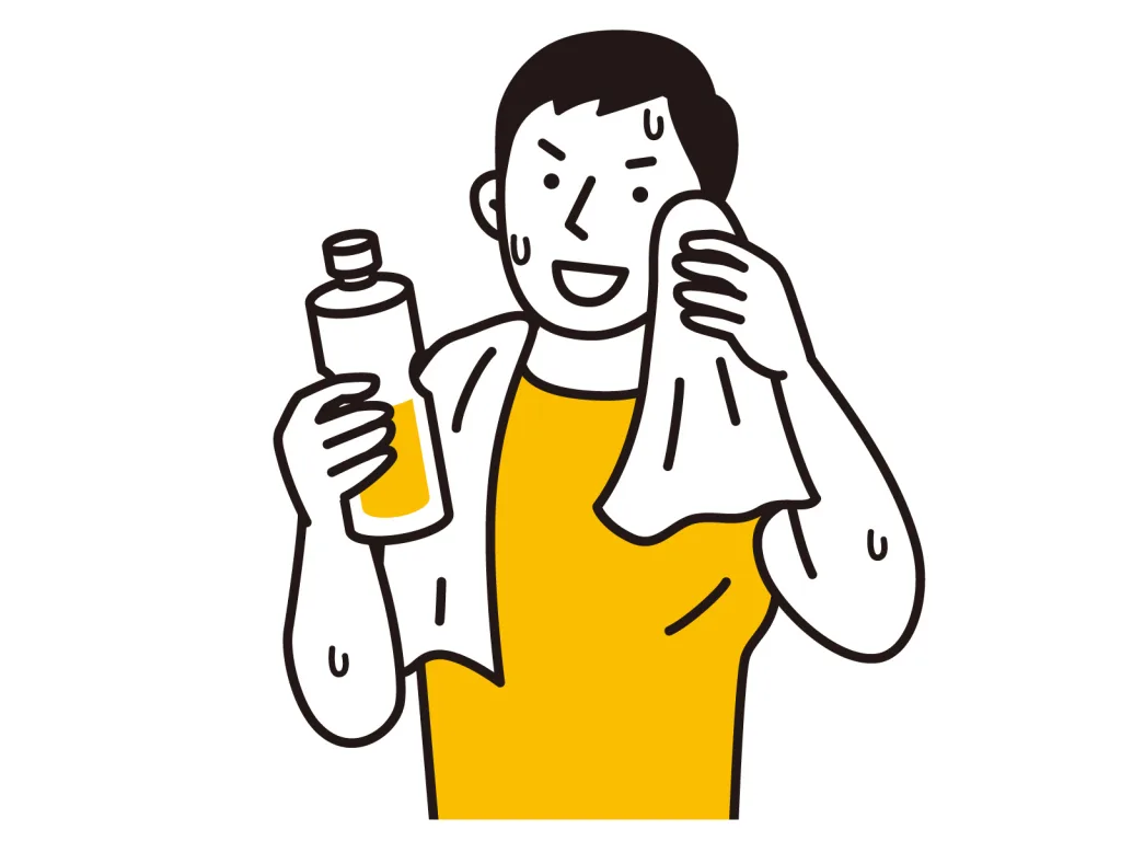 汗をかき水を持つ男性
