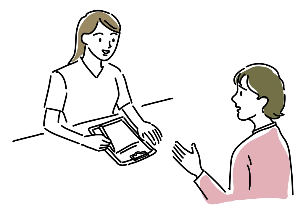 エステスタッフに相談する女性
