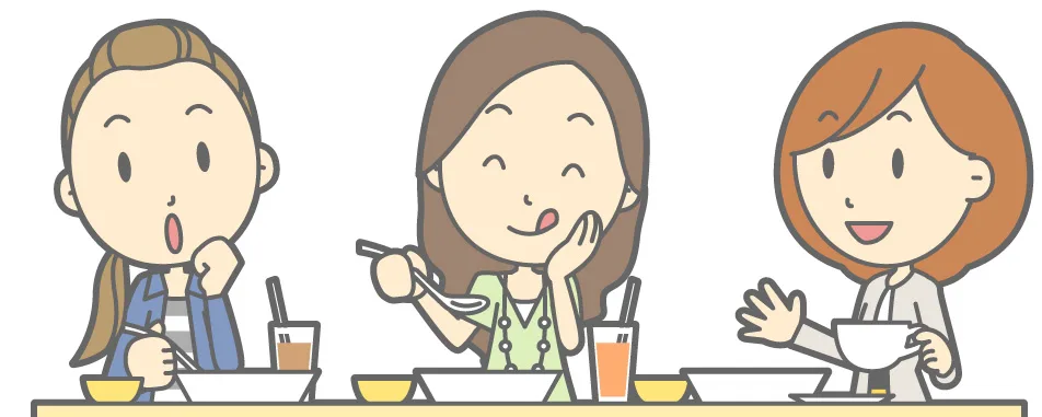 楽しそうに食事をする女性三人