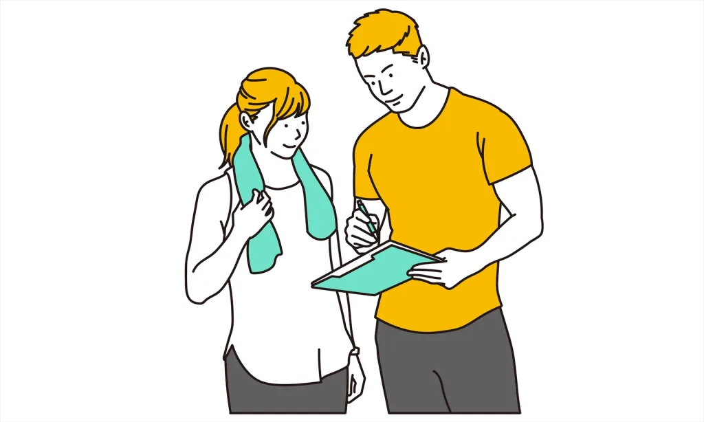 トレーナーと筋トレ教わる女性