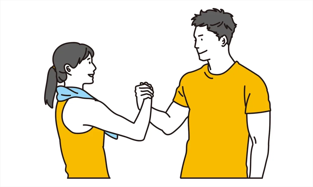 手を組み合う男女