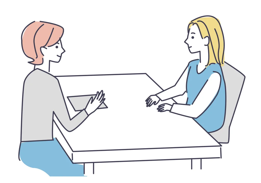 話し合う女性2人