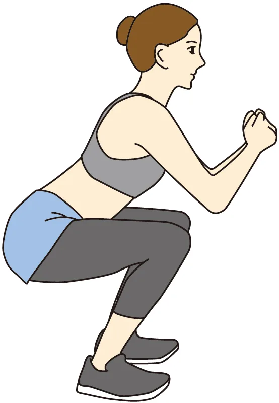 スクワットする女性