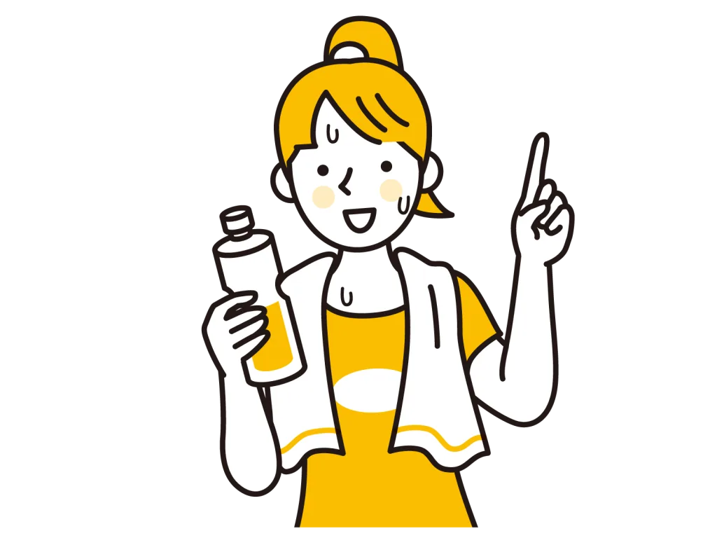 水分補給をしながら指差しする女性
