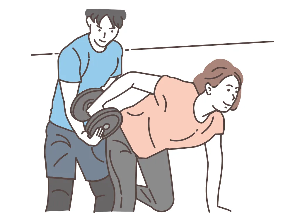 ワンハンドローする女性とトレーナー