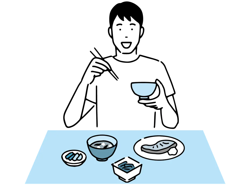 健康的な食事をする笑顔の男性